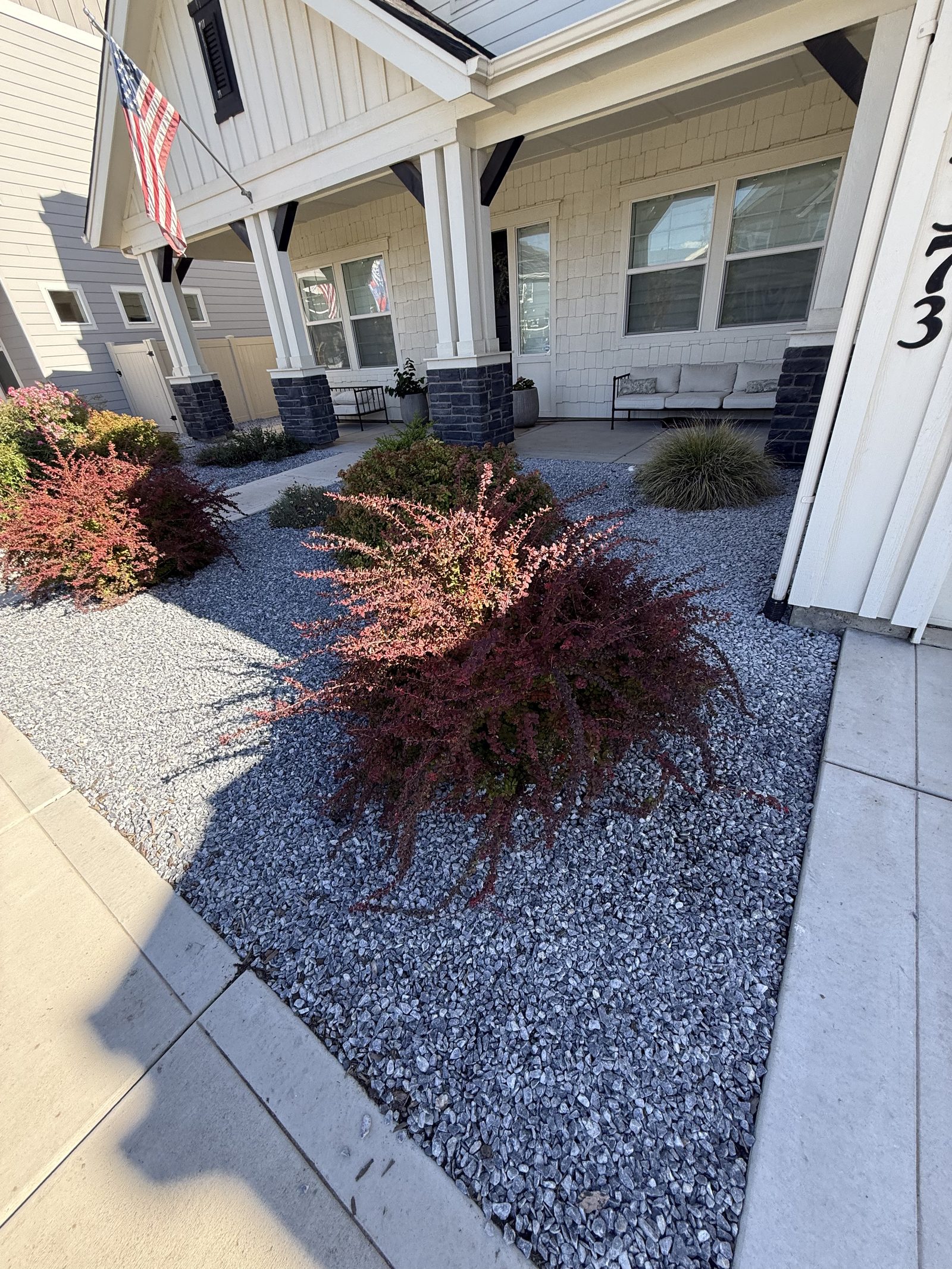 Finished front bed with blue gravel — Meridian Idaho